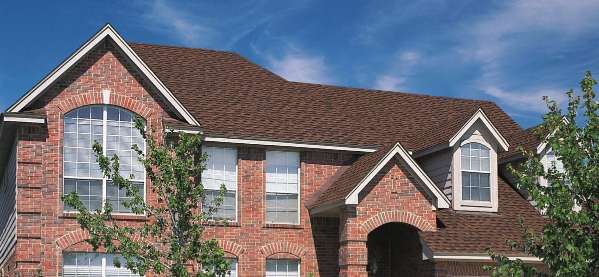 houses with green shingle roofs